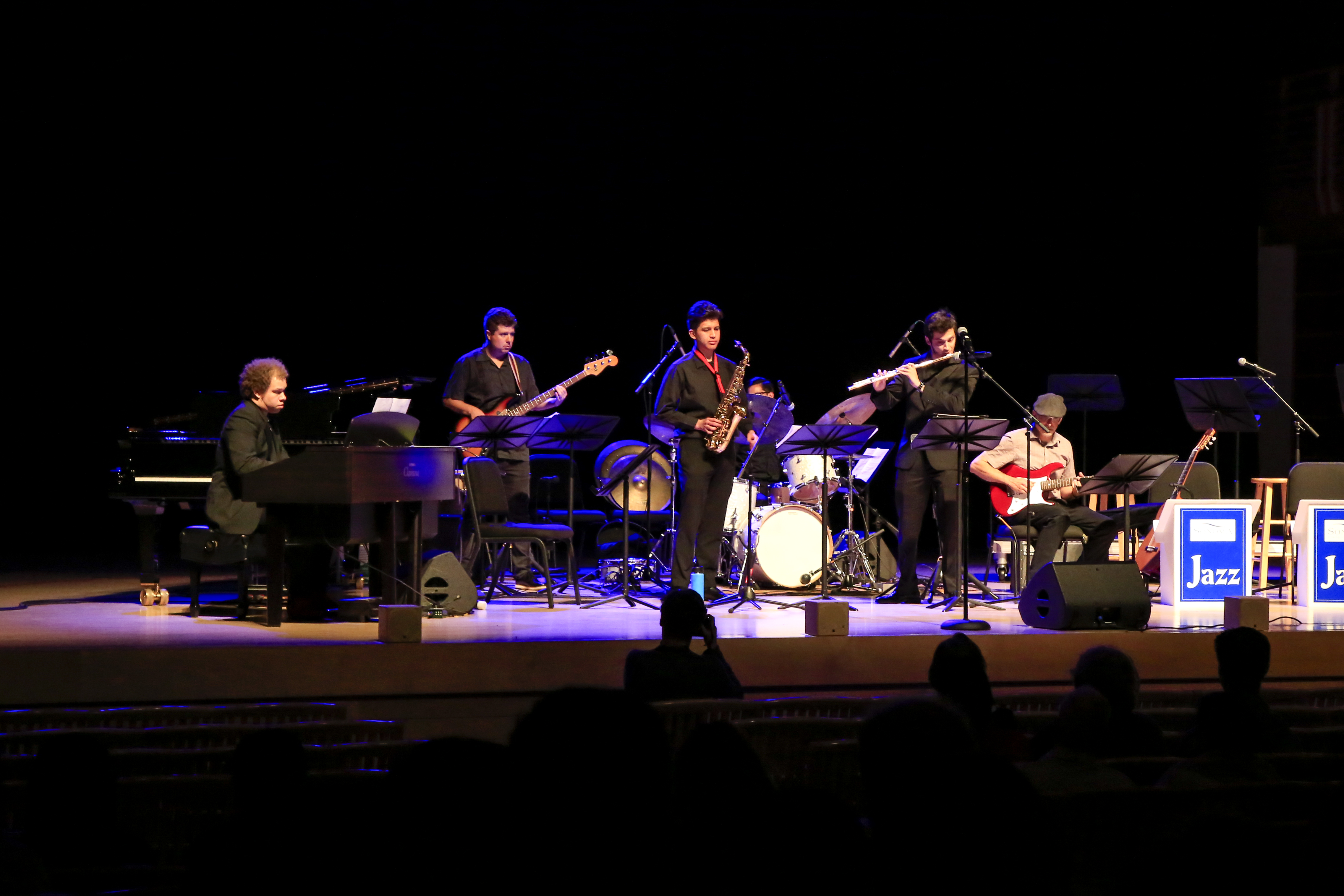 Latin Band performing on stage in Weill Hall