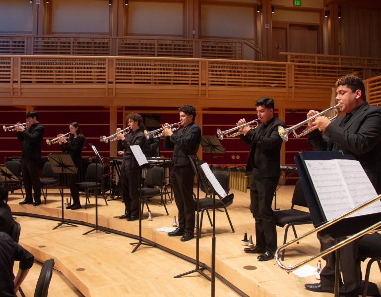 Trumpeters standing and performing