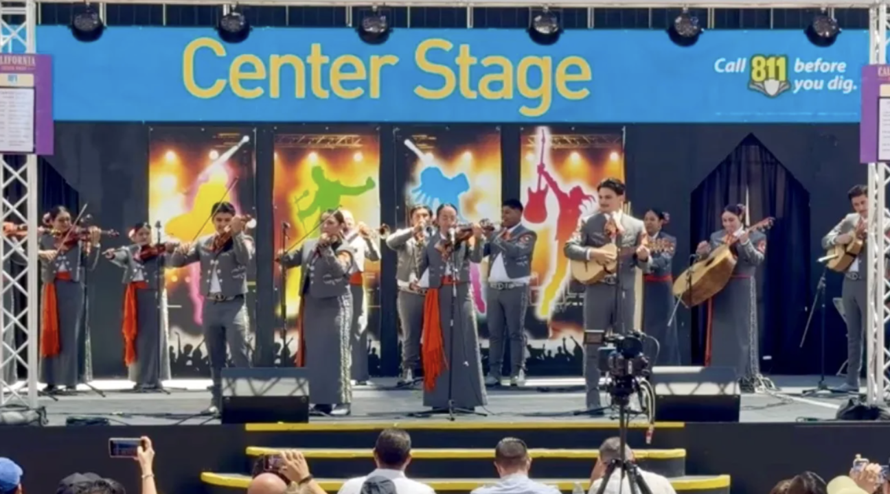 Members of the Cantares de Mi Tierra youth mariachi ensemble perform on the Center Stage at the California State Fair in Sacramento.