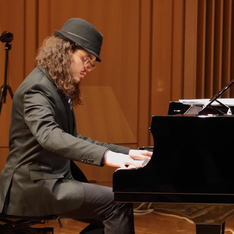 Ben Rosenblum playing piano