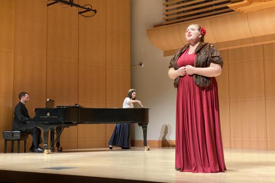 Opera Singer with piano in background