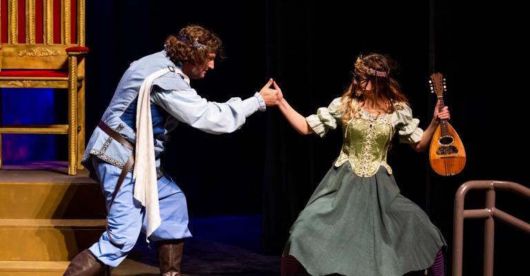 Scene from Once Upon a Matttress with characters playing a thumb war