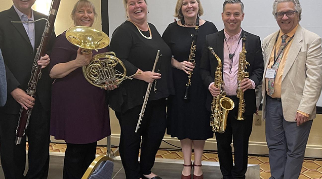 Group of musicians standing for a group picture