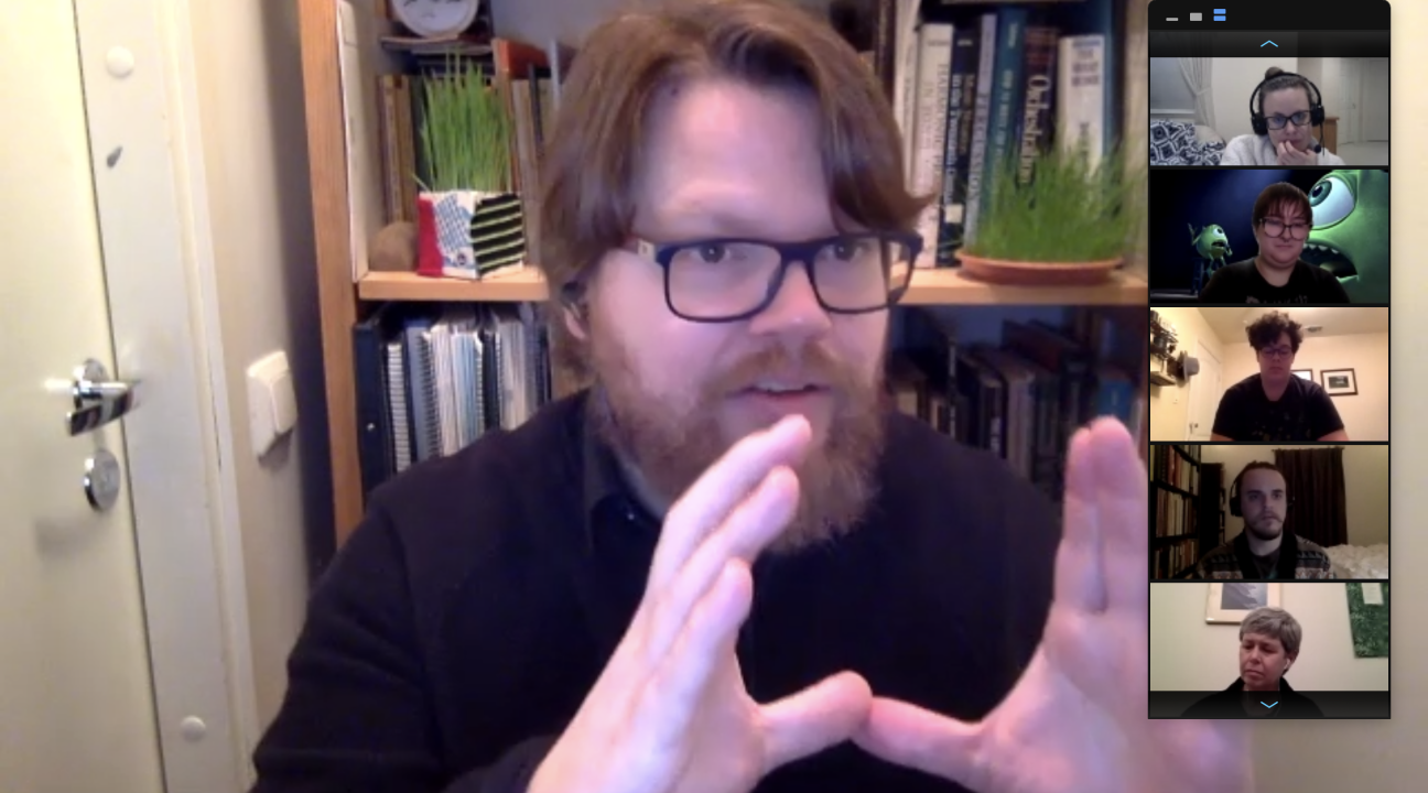 Alex Freeman talking to students using his hands 
