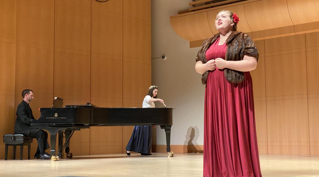 Opera Singer with piano in background