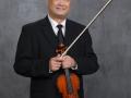 Headshot of Jay Zhong holding a violin