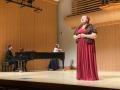 Opera Singer with piano in background