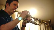 Ian Carey playing trumpet
