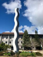 This is a photograph of a statue in the central Sonoma State University campus