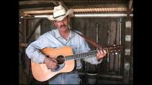 Scott Gerber with cowboy hat and guitar