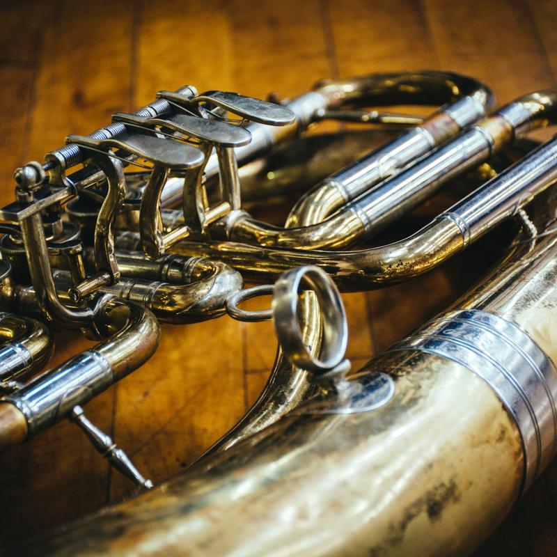 Tuba a the wooden floor