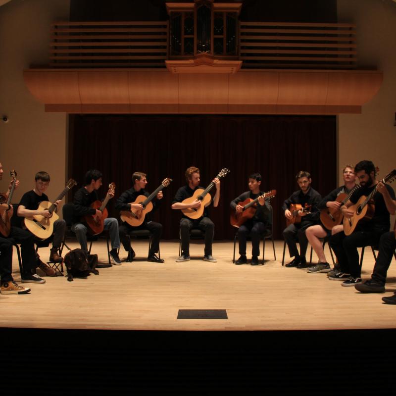 Guitar Ensemble playing on stage