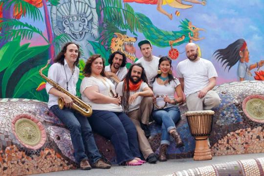 Group Photo of Lion Ben Hur with colorful mural in background