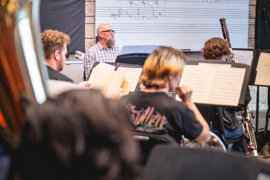 Thom Limbert rehearsing Songscapes with SSU Symphonic Wind Ensemble