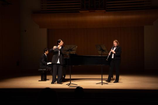 Trio performing on Schroeder stage