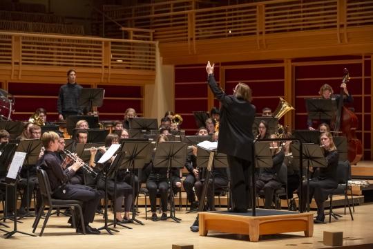 Kim Mieder conducting noma winds in weill hall
