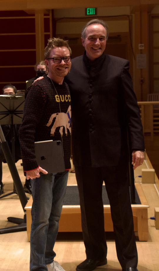 John Mackey and Andy Collinsworth standing next to each other