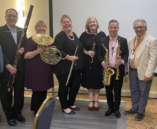Group of musicians standing for a group picture