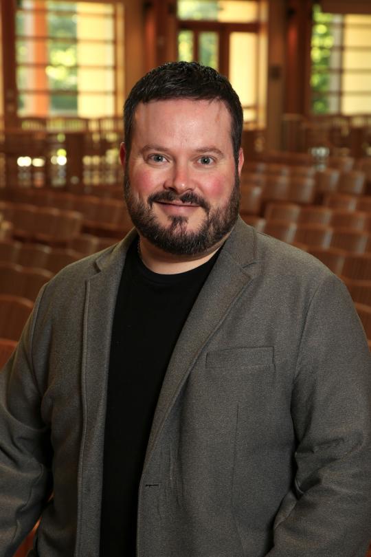 Justin Montigne Headshot in Weill Hall