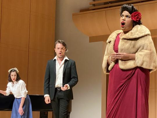 Three singers staggered on stage