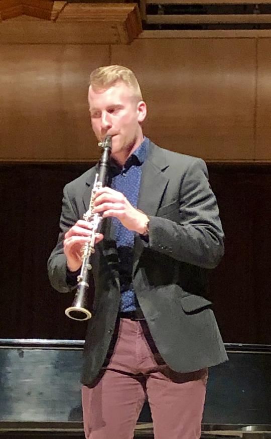 Sonoma State University music major Thomas Gosnell plays the clarinet