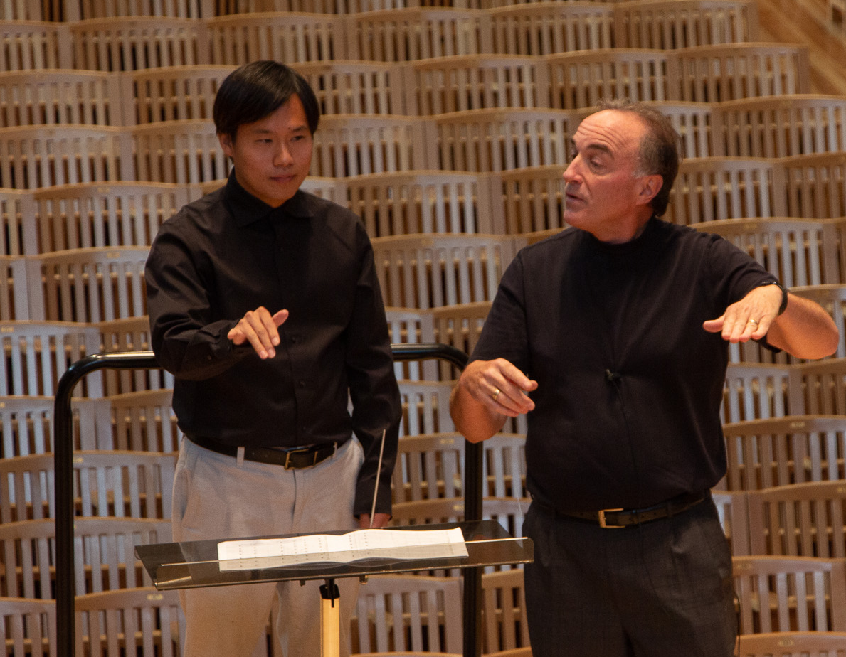 instructor teaching a conductor